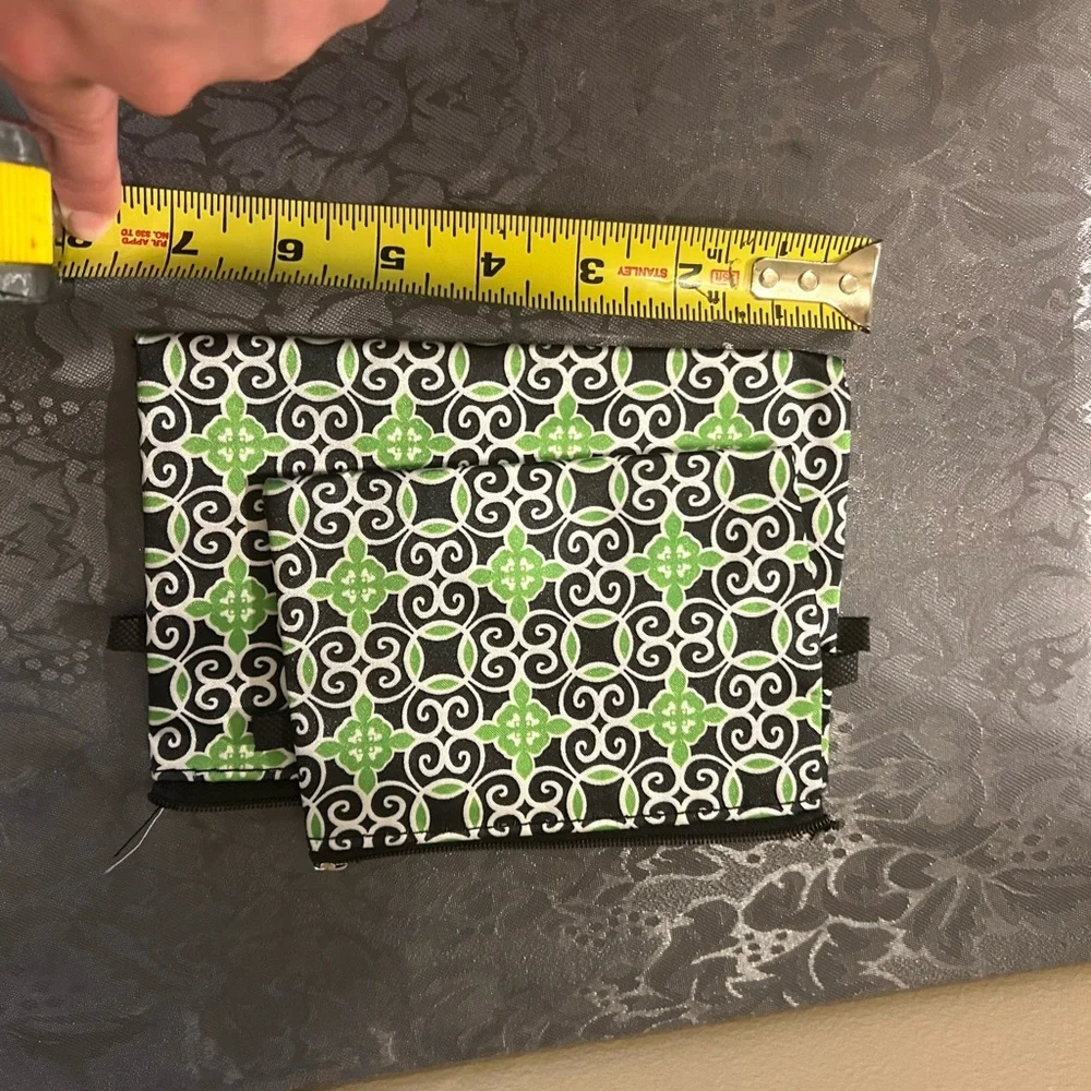 Sassy & Chic cosmetic bags featuring a green, black, and white geometric tile